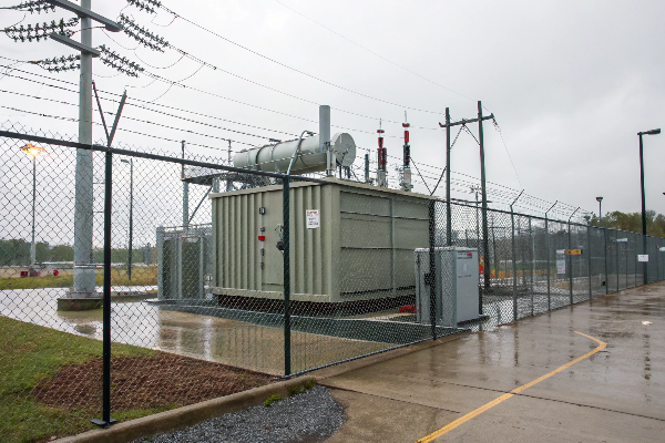 Outdoor electrical transformer station in rainy weather