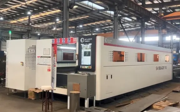 Fiber laser cutting machine cutting steel sheet for diesel generator base frames and enclosure panels &mdash; H&C factory in Jiangsu, China
