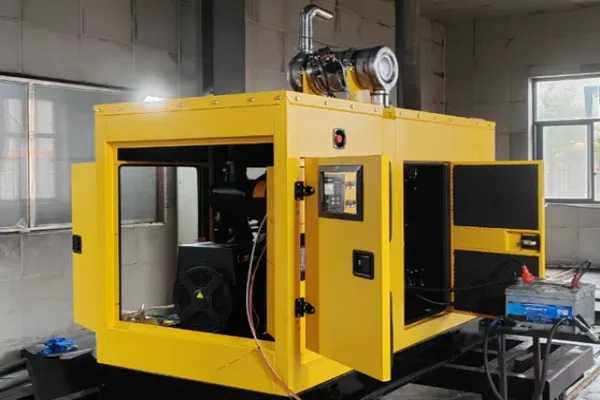 A silent Cummins diesel generator unit in a bright yellow soundproof enclosure for outdoor industrial use.