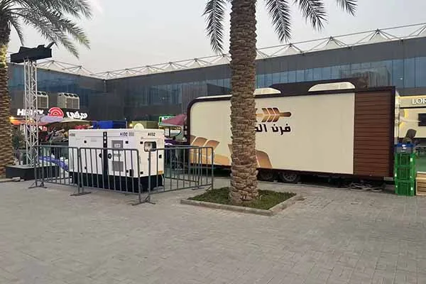 outdoor silent diesel generator providing power to a mobile unit